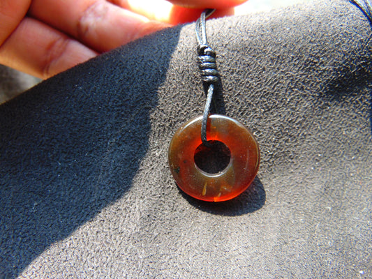 1.3 gr Donut Pendant Indonesia Red Amber