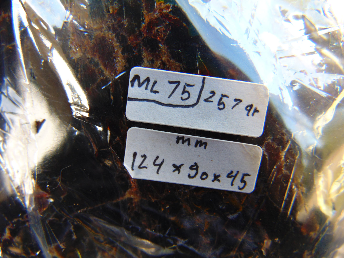 257 gram Full polished Indonesian Black Blue Amber for Healing ML75
