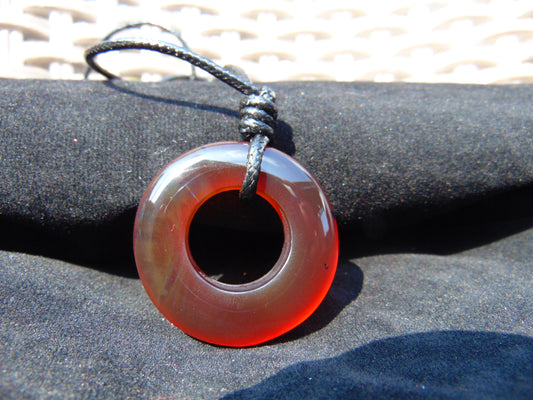 7.9 gr Donut Pendant Indonesian Red Amber for Healing 26N94