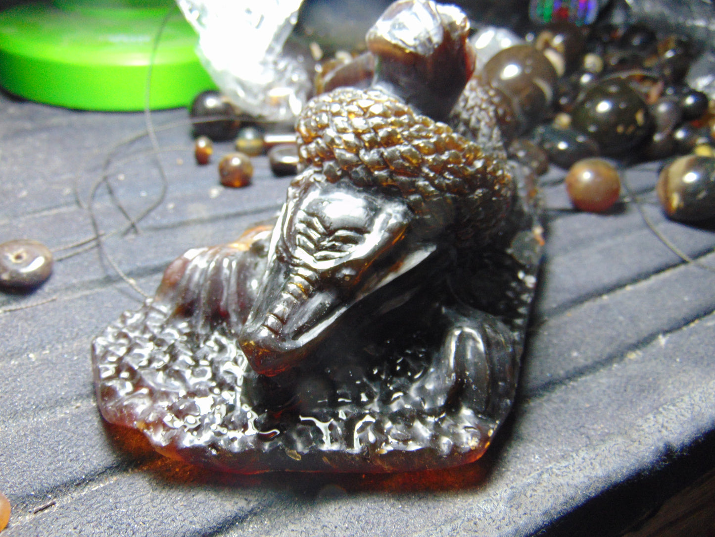 357 gram Dragon carving 7x3.5x3.1"  Indonesian Dark Green Amber