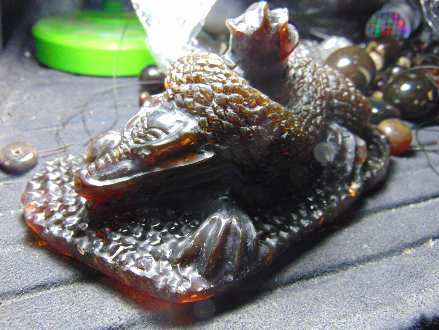 357 gram Dragon carving 7x3.5x3.1"  Indonesian Dark Green Amber