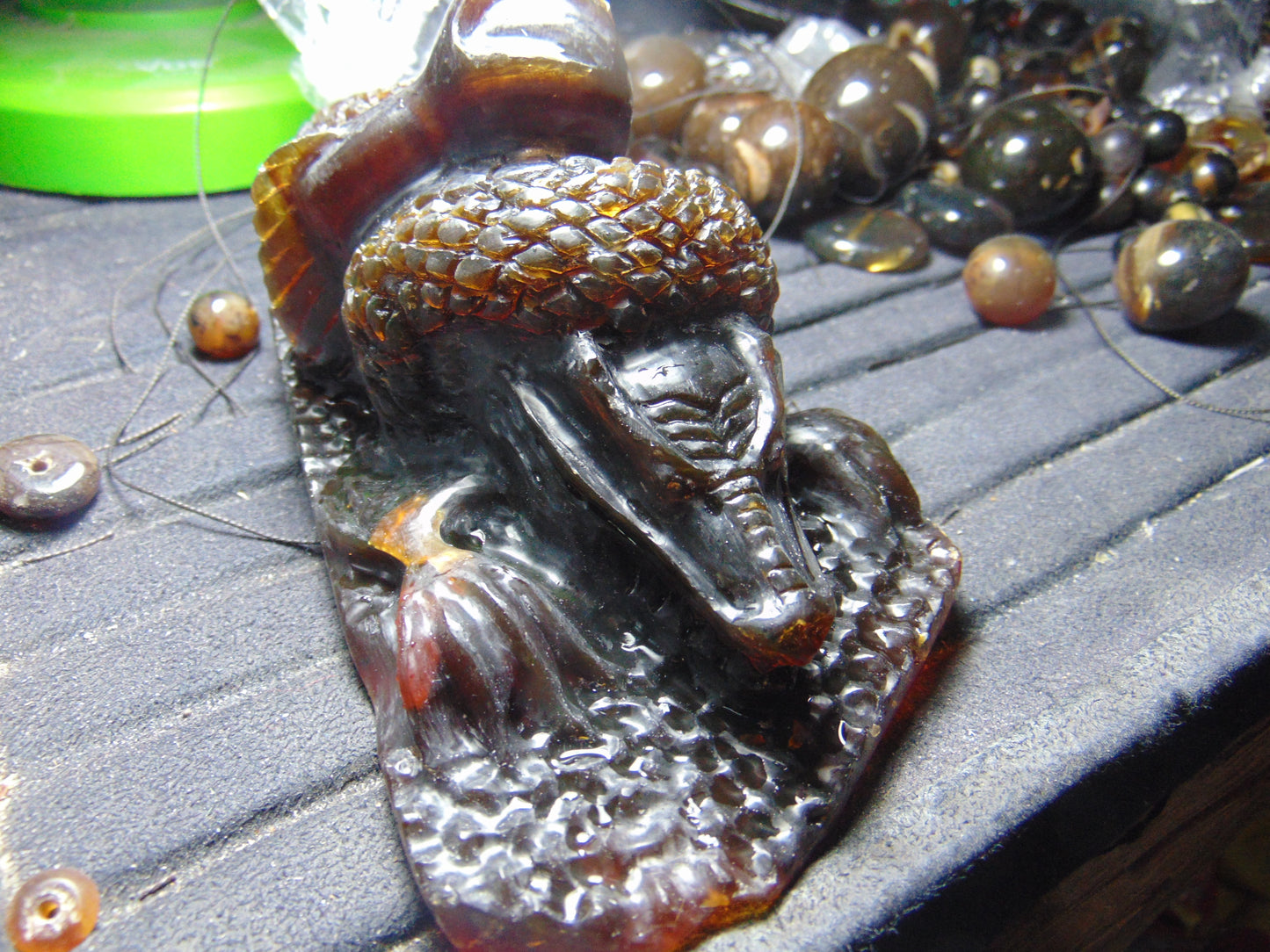 357 gram Dragon carving 7x3.5x3.1"  Indonesian Dark Green Amber