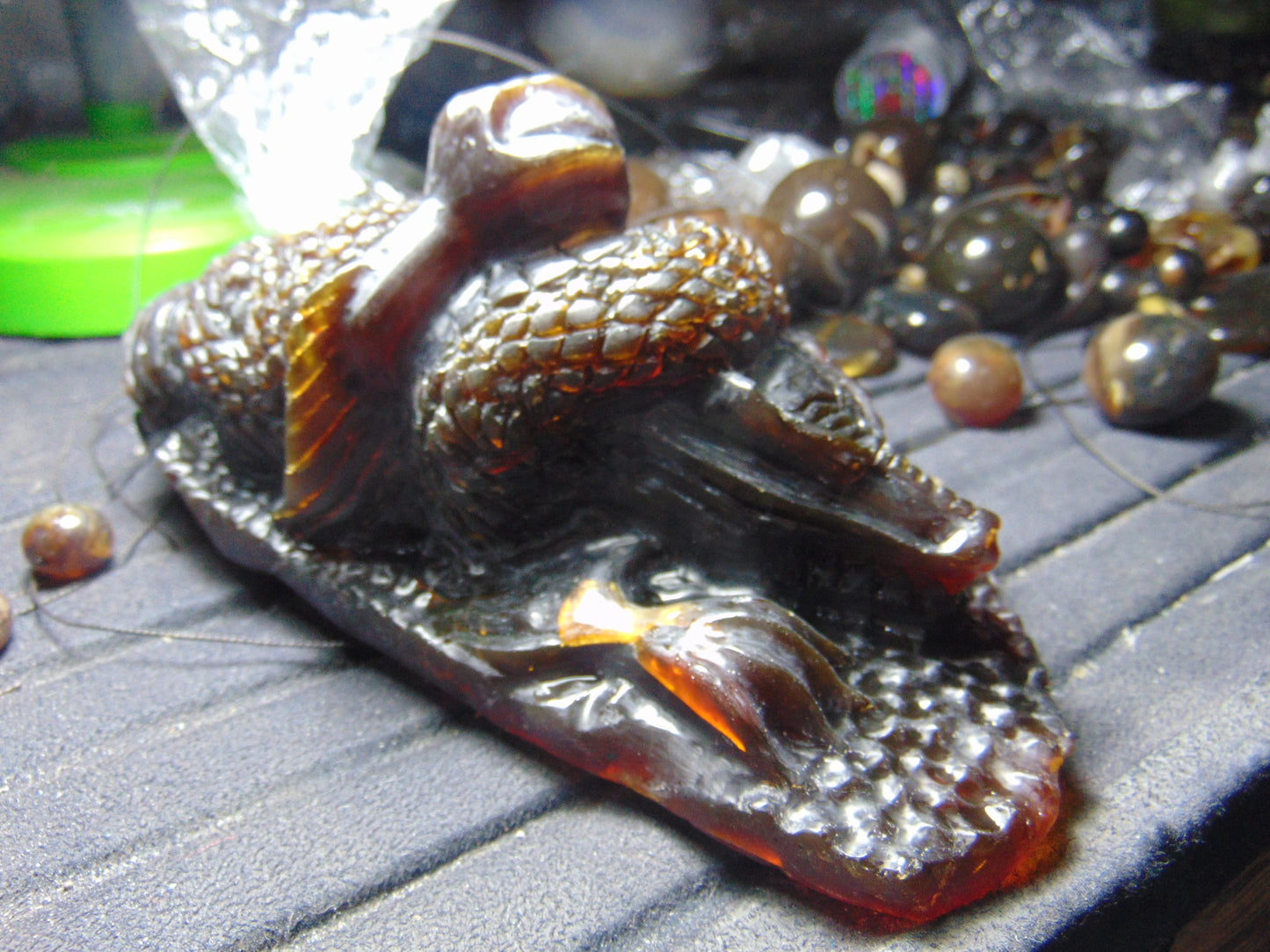 357 gram Dragon carving 7x3.5x3.1"  Indonesian Dark Green Amber