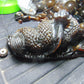 357 gram Dragon carving 7x3.5x3.1"  Indonesian Dark Green Amber
