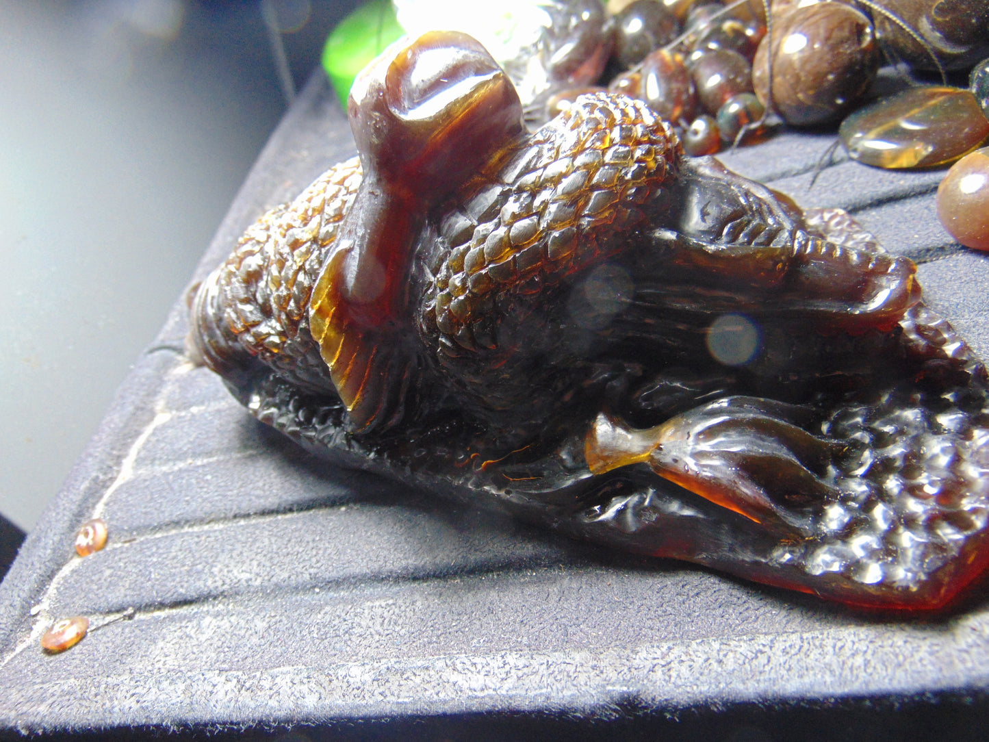 357 gram Dragon carving 7x3.5x3.1"  Indonesian Dark Green Amber