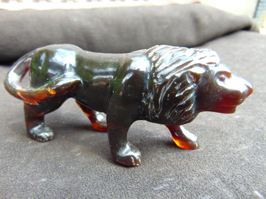 68 gr The 3D lion carving on Indonesian Cherry Red Amber for Healing L3P1