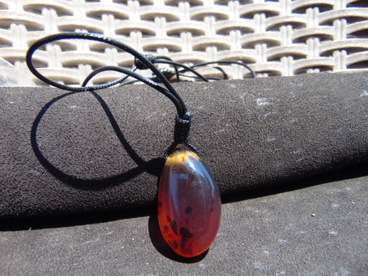 11 gram Pendant Indonesian Inclusion Red Blue Amber for Healing A26