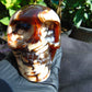 292 grams Skull Carving Indonesian Red White Zebra Amber for healing 96x73 mm AJT102