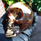 292 grams Skull Carving Indonesian Red White Zebra Amber for healing 96x73 mm AJT102