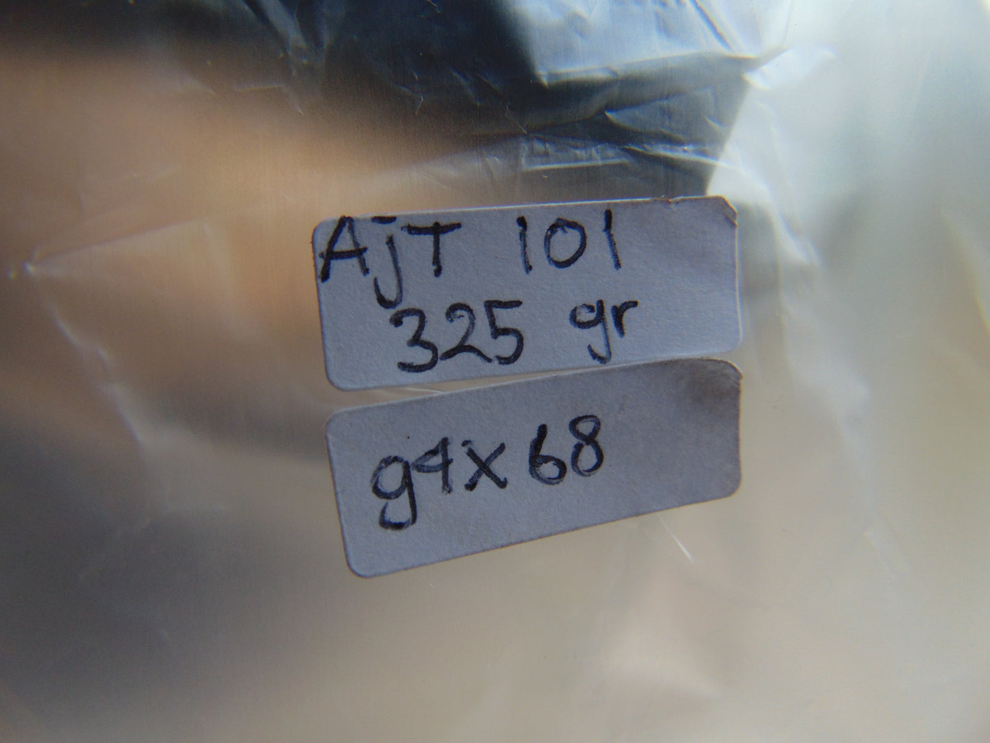 325 grams Skull Carving Indonesian Sumatran Blue White Amber for healing  94x68 mm AJT101