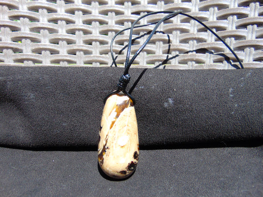 27 gr Teardrop Pendant Indonesian white Amber for Healing 25A69