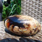 214 gr Shaped Rugby Indonesian Zebra White Amber for Healing ST126