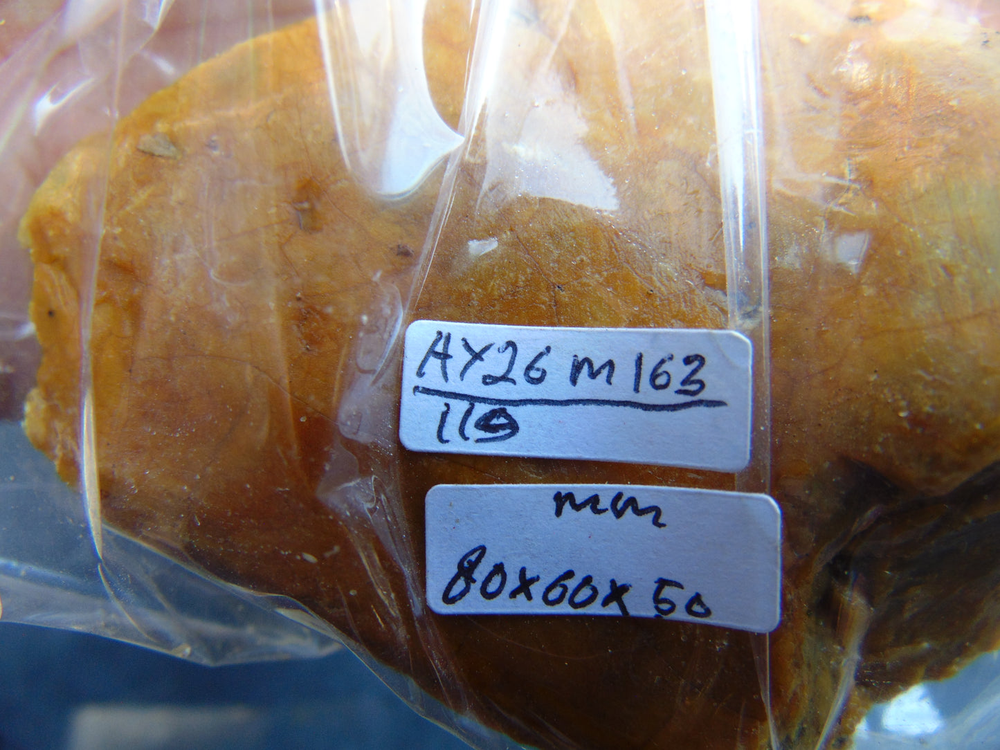 119 gram Polished Indonesia Yellow Aromatic Amber for Healing AY26M163