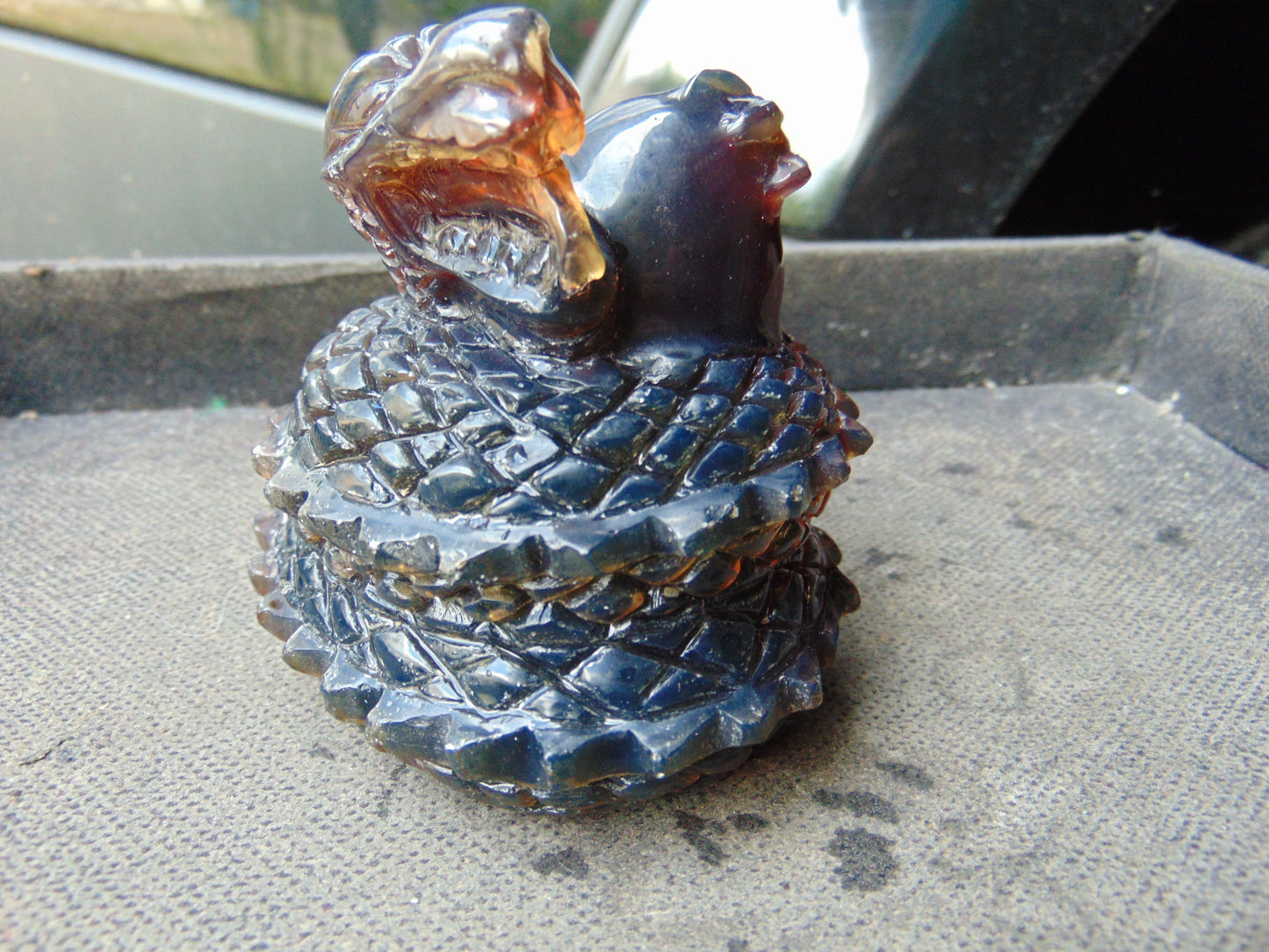 219 gram Dragon carving 100x83x70 mm Indonesian Blue Amber