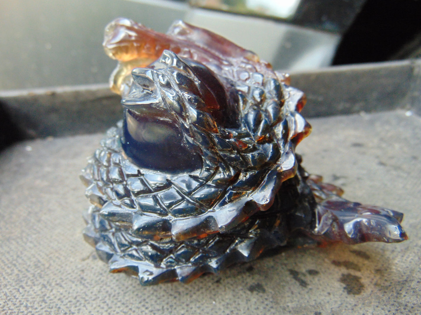 219 gram Dragon carving 100x83x70 mm Indonesian Blue Amber