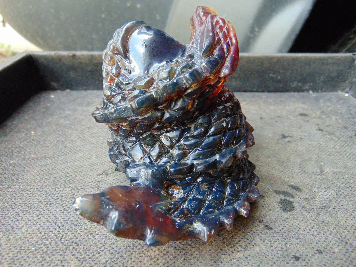 219 gram Dragon carving 100x83x70 mm Indonesian Blue Amber