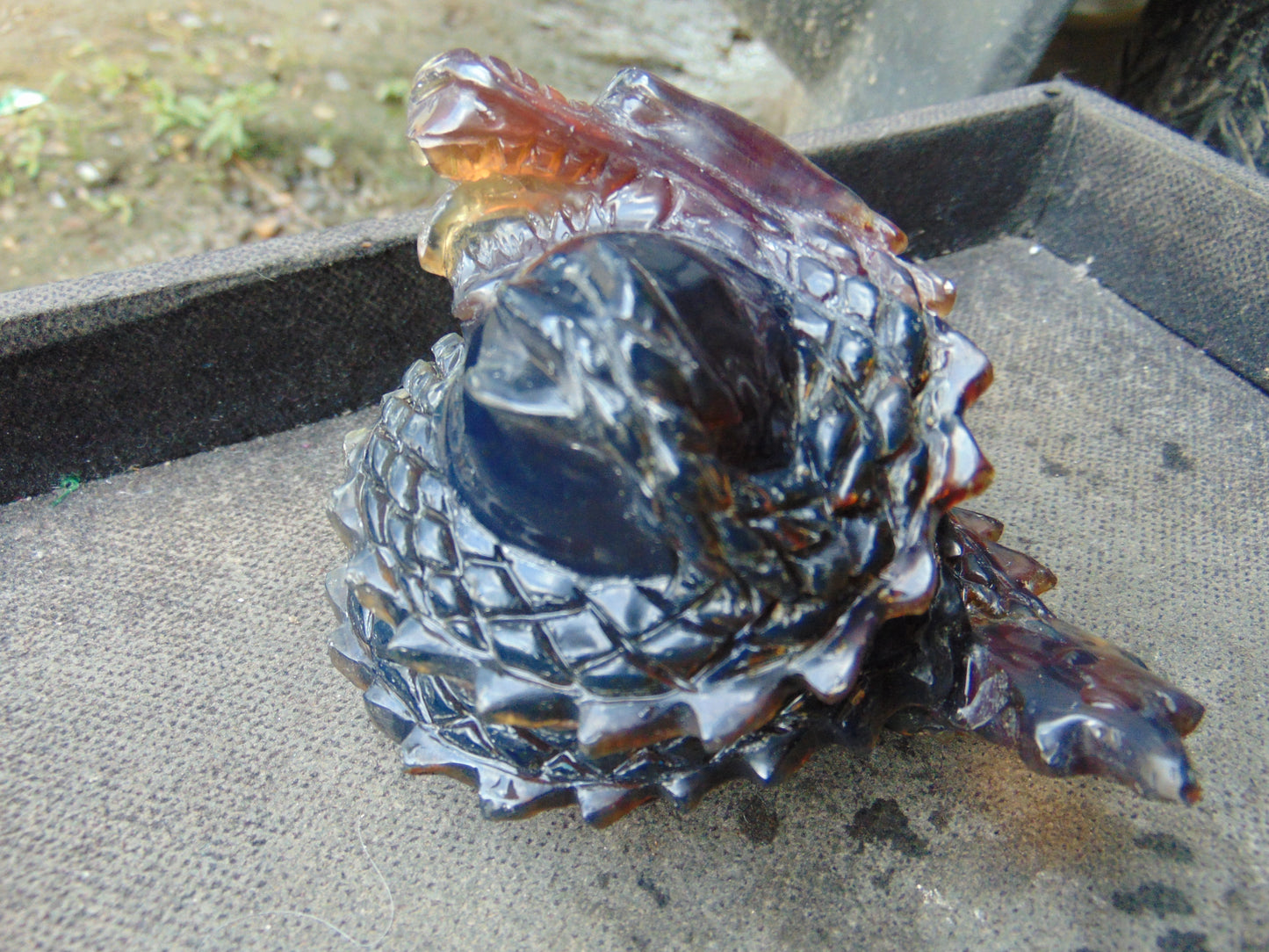 219 gram Dragon carving 100x83x70 mm Indonesian Blue Amber