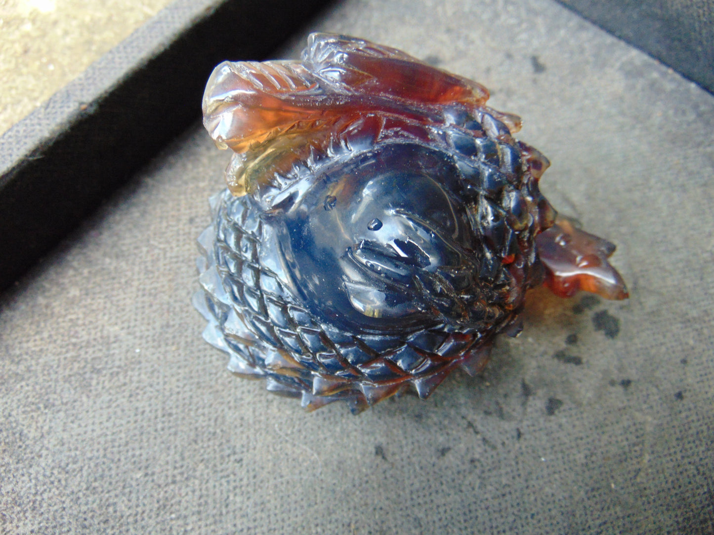 219 gram Dragon carving 100x83x70 mm Indonesian Blue Amber