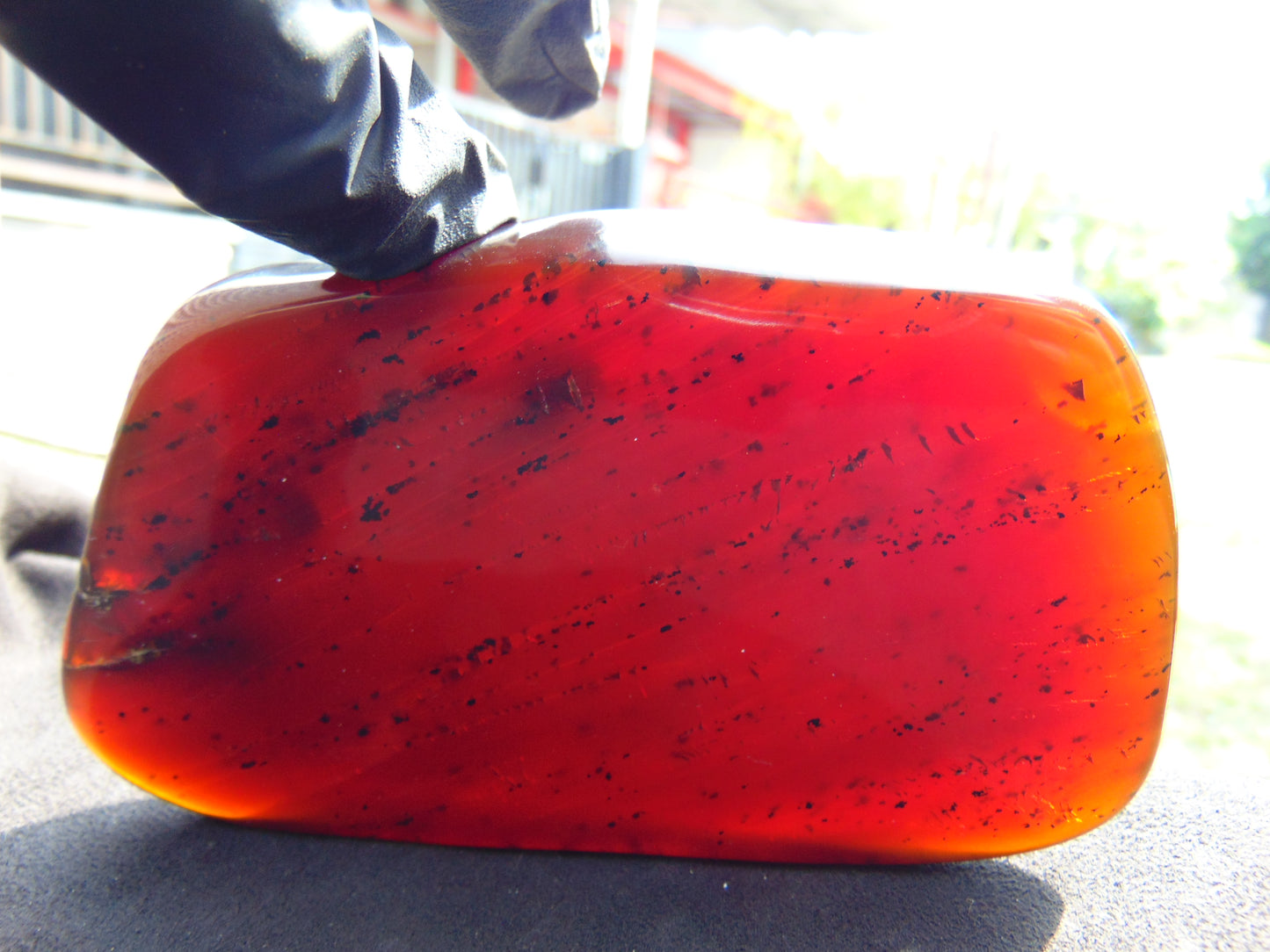144 gram Slab  polished Indonesian Sumatra Cherry Red Amber for Healing 25A204
