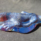 147 gr 160x70x43 mm The *Salamander* (mystical fire lizard) carving on *Indonesian Blue Amber*for Healing AJ190