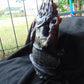 974 gr 9x6x2.8 in The carving of *Lord Ganesha* (God of Knowledge and Remover of Obstacles) on *Indonesian Dark Green Amber*
