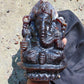 974 gr 9x6x2.8 in The carving of *Lord Ganesha* (God of Knowledge and Remover of Obstacles) on *Indonesian Dark Green Amber*