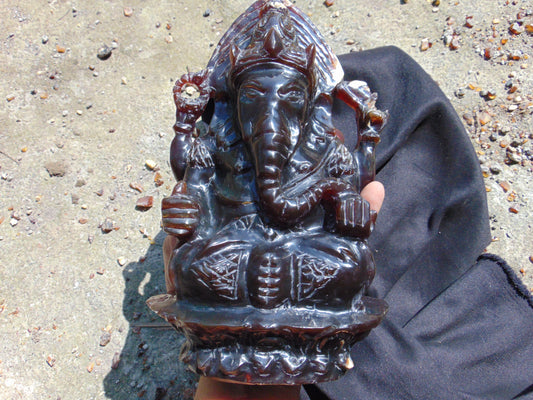 974 gr Ganesha carving 9x6x2.8 in  Indonesian Dark Green Amber