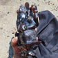 974 gr 9x6x2.8 in The carving of *Lord Ganesha* (God of Knowledge and Remover of Obstacles) on *Indonesian Dark Green Amber*