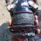 974 gr 9x6x2.8 in The carving of *Lord Ganesha* (God of Knowledge and Remover of Obstacles) on *Indonesian Dark Green Amber*