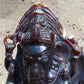 974 gr 9x6x2.8 in The carving of *Lord Ganesha* (God of Knowledge and Remover of Obstacles) on *Indonesian Dark Green Amber*